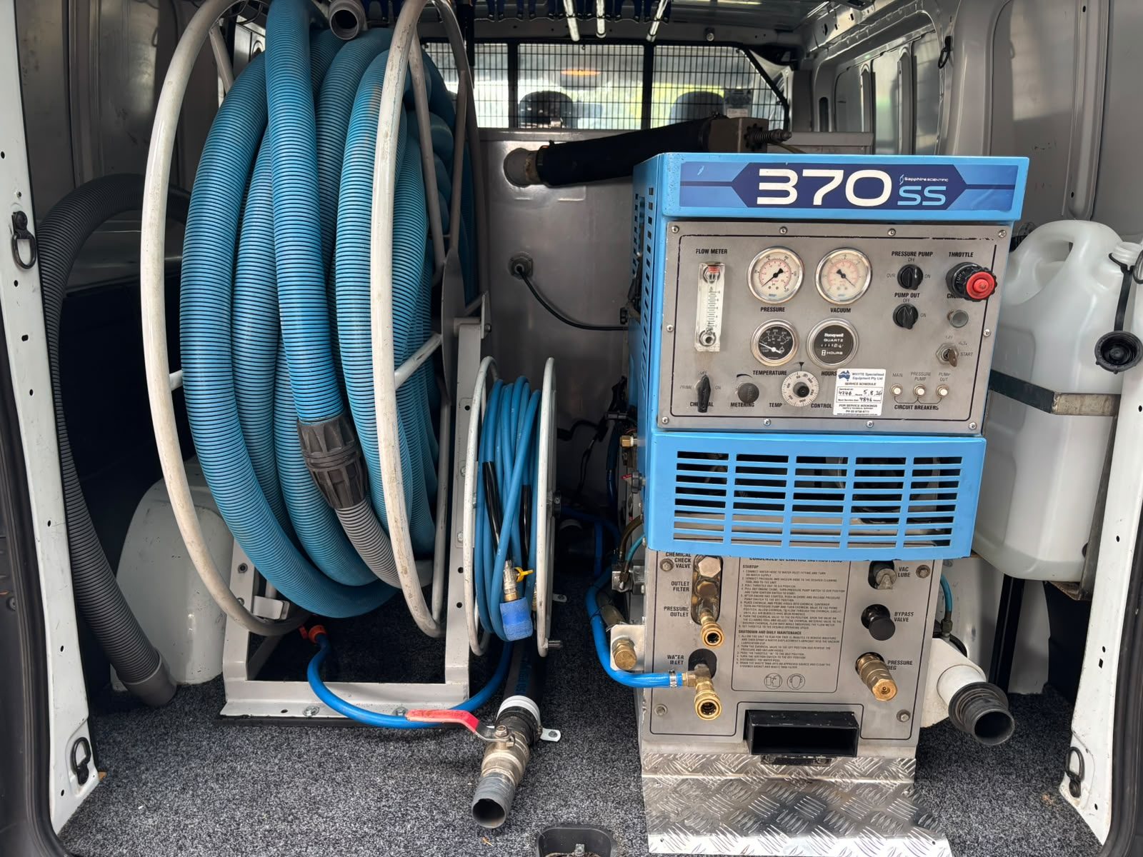Pristine Carpet Kleaning truck-mounted cleaning equipment and hose reel